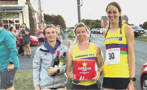  ?? ?? The Scarboroug­h AC winning ladies team at the Ravenscar Rumble Fell Race