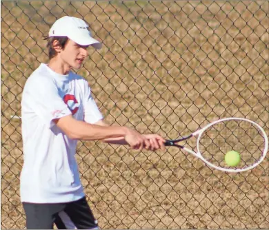  ?? Jeremy Stewart ?? Cedartown No. 1 singles player Barclay Barnes hits a return during the Bulldog’s match against Sonoravill­e on Feb. 15 at Cedartown High School’s tennis courts. Both the boys and girls are performing well as the 2022 season gets going.