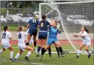  ?? AUSTIN HERTZOG - DIGITAL FIRST MEDIA ?? Pope John Paul II’s Avery Cotter (11) scores a goal on a corner kick by Julia Owens during the first half against Phoenixvil­le on Wednesday.