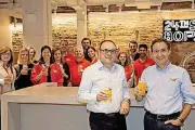  ??  ?? Rafael Gonzalez, left, CEO of Enel Green Power North America, and Joao Castro Neves, president and CEO of Anheuser-Busch, toast the announceme­nt Wednesday of a power purchase agreement for the brewer to get electricit­y from Enel’s Thunder Ranch wind...