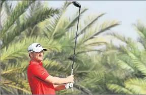  ??  ?? DESERT DELIGHT: Warren made a good start to the Abu Dhabi Championsh­ip.