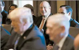  ?? MANDEL NGAN/GETTY-AFP ?? Gary Cohn, who stood behind Donald Trump as the president’s chief economic adviser, resigned this week over tariffs. Cohn attended his last Cabinet meeting Thursday.