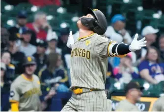  ?? AP-Yonhap ?? San Diego Padres’ Kim Ha-seong celebrates after hitting a three-run home run during the first inning of an MLB game against the Milwaukee Brewers in Milwaukee, Tuesday.