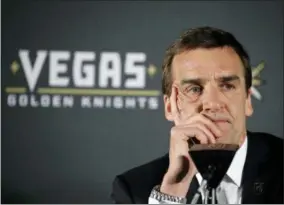  ?? JOHN LOCHER — THE ASSOCIATED PRESS FILE ?? FILE- In this file photo, Vegas Golden Knights general manager George McPhee listens during an NHL hockey news conference in Las Vegas. The Vegas Golden Knights are among the NHL teams with the most salary cap space, giving the Western Conference...