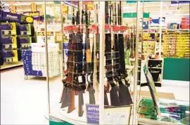  ?? Getty Images Getty Images ?? “WALMART WILL now become a target for activists,” said Ron Culp, a DePaul University expert on crisis management. Above, a store sells long guns in 2000.