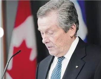  ?? A R LY N MCADOREY THE CANADIAN PRESS ?? Toronto Mayor John Tory announces his resignatio­n during a news conference at city hall in Toronto on Friday, when he admitted to having an inappropri­ate relationsh­ip with a staff member.