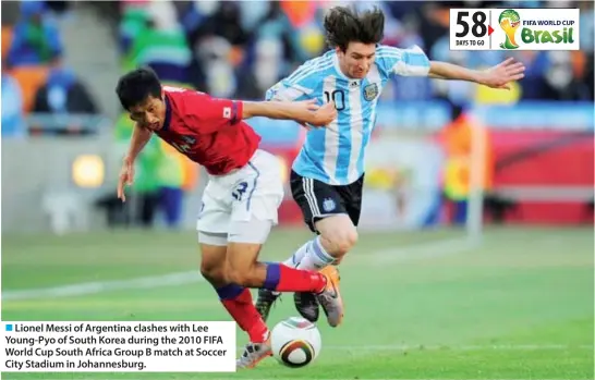  ??  ?? Lionel Messi of Argentina clashes with Lee Young-Pyo of South Korea during the 2010 FIFA World Cup South Africa Group B match at Soccer City Stadium in Johannesbu­rg.