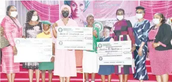  ??  ?? L-R: Ronke Soyombo, special adviser on education, Ogun State; Bolanle Oluomo, wife of speaker, Ogun State House of Assembly; Bamidele Abiodun, first lady, Ogun State; Tomi Coker, commission­er for health, Ogun State; Kike Longe, commission­er for industry, Ogun State; Bose Ogunleye Permanent Secretary, ministry of education, Ogun State, with the girl-children in Abeokuta celebratin­g the Internatio­nal Girl Child Day.