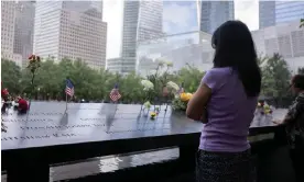  ?? Friends and family pay respects to their fallen loved ones at the World Trade Center Memorial in New York. ?? Photograph: Derek French/Shuttersto­ck