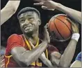 ?? Gary Coronado Los Angeles Times ?? CHIMEZIE METU might be forced to sit out if the Trojans want to avoid NCAA sanctions.