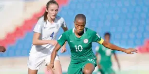  ??  ?? Super Falcons younghest player, Rasheedat Ajibade (R) of Nigeria is challenged by Hollie Olding of England during the FIFA U-17 Women’s World Cup Jordan in 2016