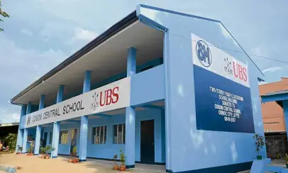  ??  ?? SM Foundation donated this two-story, four-classroom school building to the Cogon Central School in Ormoc, Leyte.