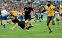  ?? AP ?? In what has become a familiar sight, the All Blacks cross the tryline, this time from Ben Smith in the win over Australia in Yokohama last month.