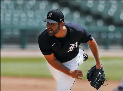  ?? CARLOS OSORIO — THE ASSOCIATED PRESS ?? Detroit Tigers pitcher Michael Fulmer throws during an intrasquad baseball game on Wednesday in Detroit.