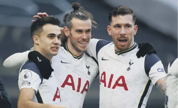  ??  ?? Tottenham Hotspur’s Gareth Bale (centre) celebrates scoring their side’s fourth goal of the game.