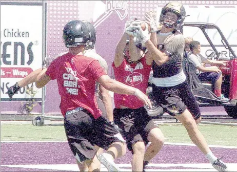  ?? SUBMITTED PHOTO ?? McDonald County defensive back Marshall Foreman battles a Broken Arrow wide receiver for possession of a pass during a 7-on-7 camp at Fayettevil­le High School on July 14. catches a touchdown pass from Shiloh Jackson against Broken Arrow at a 7-on-7...