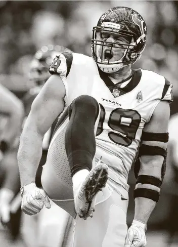  ?? Brett Coomer / Staff photograph­er ?? After mising most of the past two seasons with injuries, J.J. Watt celebrates one of his three sacks of New York Giants quarterbac­k Eli Manning on Sept. 23, 2018. Watt finished the season with 16 sacks.