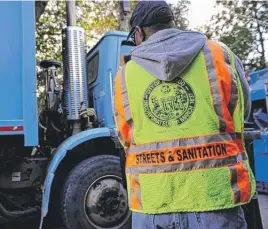  ?? SUN- TIMES FILE PHOTO ?? Chicago's $ 9.50- a- month fee for garbage collection covers only about a fourth of the true cost of the service, city officials say.