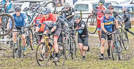  ?? Tactic ?? ●●V60 riders running from the start line including Graham Wright and Phil Warner