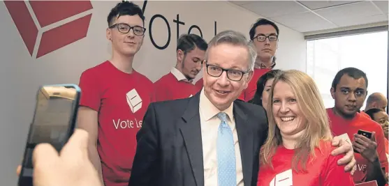  ?? Picture: Getty Images. ?? Michael Gove poses for a photograph with activists attending the launch of the Vote Leave campaign. Gove was previously an ally of David Cameron’s but will be on the opposite side to him in the upcoming EU referendum.