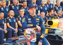  ?? Virendra Saklani/Gulf News ?? Max Verstappen of Red Bull Racing during a team group photo at Formula 1 Etihad Airways Abu Dhabi Grand Prix yesterday.