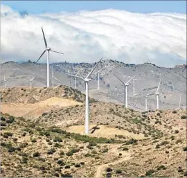  ?? Al Seib Los Angeles Times ?? CALIFORNIA, a national leader in climate change action, is likely to clash with Trump over the issue. Above, wind turbines in the Tehachapi Mountains.