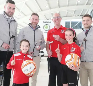 ??  ?? Rebecca, Hazel and Andrew Purcell from Walshestow­n FC pictured in Western Motors Skoda to launch this years golf classic. Skoda representa­tives Joey Smith, Robbie Matthews and Ronan Holcroft are sponsoring a Skoda car for a hole in one on the day. The...