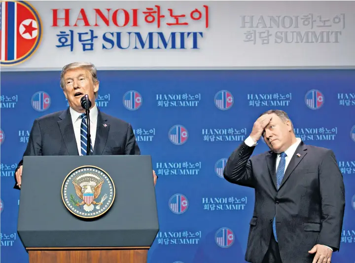  ??  ?? Donald Trump, the US president, addresses a press conference, below, after the collapse of the summit, as Mike Pompeo, the secretary of state, looks on. Right, a couple watch news coverage of the meeting in Hanoi