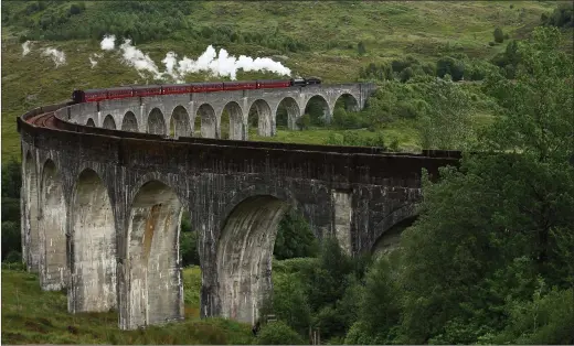  ?? Picture: Colin Mearns ?? „ A steam train pictured on the Glenfinnan Viaduct on the West Highland railway line named as one of the most scenic in the world.