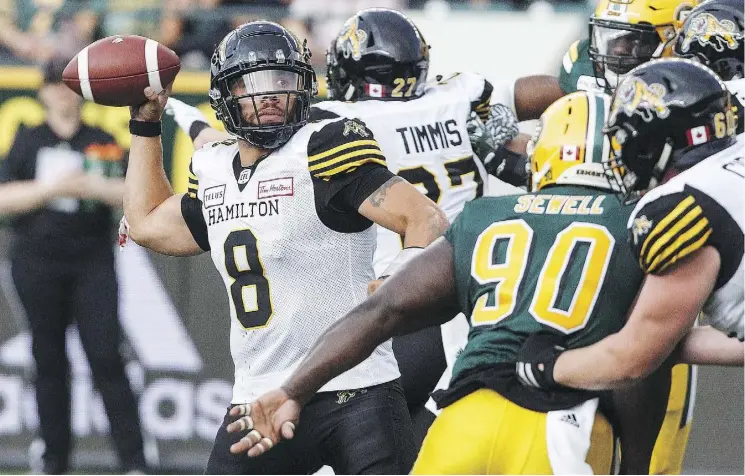  ?? JASON FRANSON/THE CANADIAN PRESS ?? Hamilton Tiger-Cats quarterbac­k Jeremiah Masoli led the East this season with more than 5,000 passing yards and 28 touchdowns.