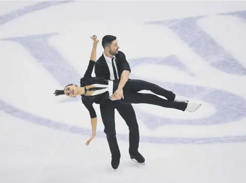  ??  ?? 0 Lewis Gibson and Lilah Fear are lying in eighth place after the rhythm dance at the World Figure Skating Championsh­ips