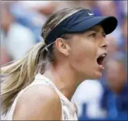  ?? ADAM HUNGER — THE ASSOCIATED PRESS ?? Maria Sharapova reacts after scoring a point against Timea Babos.