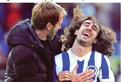  ?? PA ?? Halcyon days: Graham Potter (left) celebrates with Marc Cucurella after thrashing United