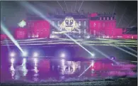  ??  ?? ILLUMINATI­ON: A picture of an owl is projected on to Hopetoun House during a preview of the 1.2- mile light trail.