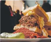  ??  ?? The Corned Beef and Brisket at the New York Deli News. Denver Post file