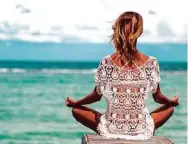  ?? Shuttersto­ck ?? Start your day with some meditation on the beach.