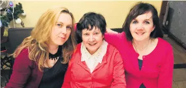  ??  ?? Big day: Leona O’Neill (on left) with mum Gloria and sister Carla and (far left) Leona and the family having Christmas dinner at her mum’s. Below: Leona gets into the festive spirit