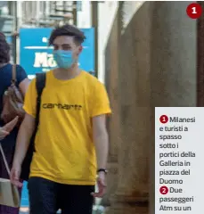  ??  ?? 1 1 Milanesi e turisti a spasso sotto i portici della Galleria in piazza del Duomo
2 Due passeggeri Atm su un vagone del metrò
3 Ciclisti, pedoni e «monopatti -natori» in corso Buenos Aires