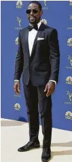  ?? AFP / Getty Images ?? Sterling K. Brown makes a tux look cool.