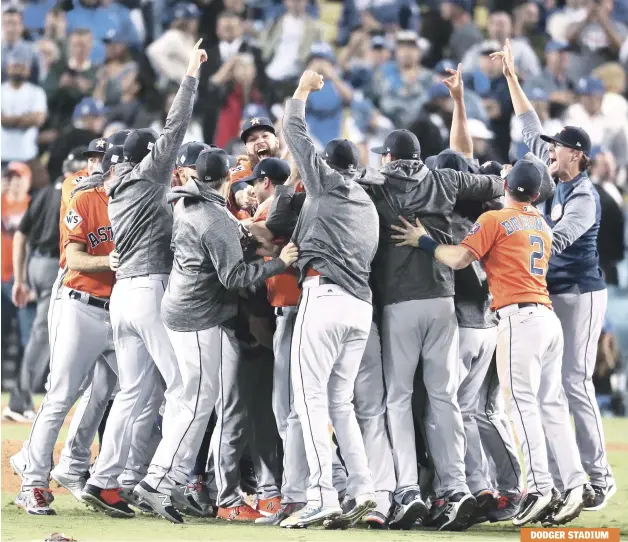  ?? FOTO AP | DISEÑO JULIO ANÍBAL RAMÍREZ ?? Jugadores de los Astros celebran en medio del diamente tras derrotar a los Dodgers en el séptimo y decisivo partido de la Serie Mundial.