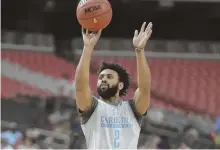  ?? AP PHOTO ?? LOOKS LIKE HE’S A GO: Joel Berry II takes some shots during North Carolina’s practice yesterday as he prepares to return from ankle injuries and play in tonight’s national semifinal vs. Oregon in Glendale, Ariz.