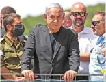  ?? ?? Prime Minister Benjamin Netanyahu visits the site of a stampede during an ultra-Orthodox religious gathLYPUN PU [OPZ ÄSL WOV[V ¶ (-7