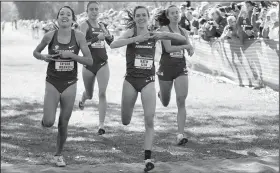  ?? NWA Democrat-Gazette/DAVID GOTTSCHALK ?? University of Arkansas women’s cross country team members Taylor Werner (from left), Devin Clark, Katie Izzo and Carina Viljoen finish in the first four places Friday.