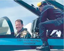  ?? COURTESY ?? Frank Weisser sits in the cockpit of an F/A-18F Super Hornet that bears the name of Pete “Maverick” Mitchell.