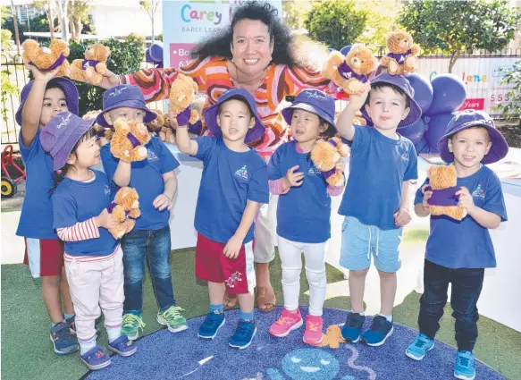  ??  ?? Early Learning Centre kids show their BEAR program bears after meeting author Dimity Powell.