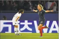  ?? Francois Xavier Marit / AFP / Getty Images ?? France’s midfielder Amandine Henry, right, celebrates after scoring a goal during the Women’s World Cup Group A soccer match on Friday at the Parc des Princes stadium, in Paris.