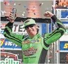  ?? JEROME MIRON/USA TODAY SPORTS ?? Kyle Busch celebrates in victory lane after winning the O’Reilly Auto Parts 500 at Texas Motor Speedway.