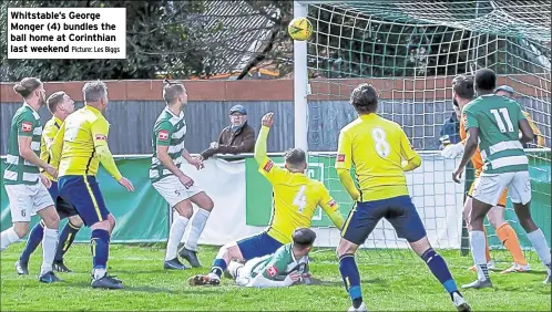  ?? Picture: Les Biggs ?? Whitstable’s George Monger (4) bundles the ball home at Corinthian last weekend