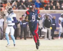  ?? GRaHAM HUGHES ?? Montreal Alouettes’ DeVier Posey runs in for a touchdown during first half CFL play against the Toronto Argonauts in Montreal on Friday. The Alouettes managed a 27-24 win over the Argos.