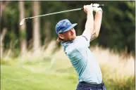  ?? Jared C. Tilton / Getty Images ?? Tyler McCumber plays his shot from the 12th tee during the third round of the Wyndham Championsh­ip on Saturday at Sedgefield Country Club in Greensboro, N.C.